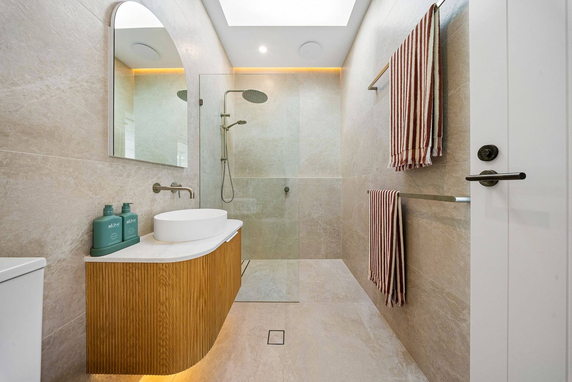 Retreat bathroom with walk-in rain shower
